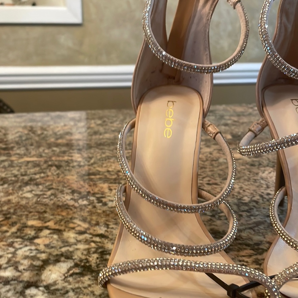 nude and gold leather Bebe heels with rhinestone straps